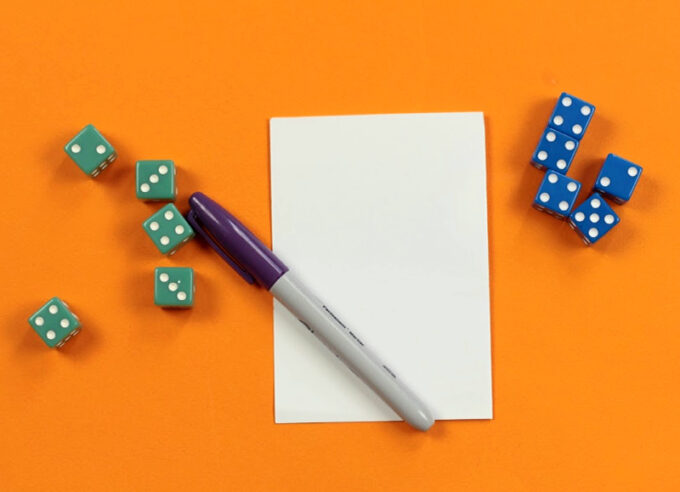 pen paper and 10 dice for addition and subtraction dice game