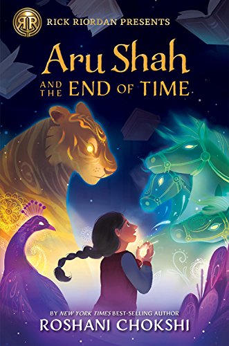 Aru Shah and the End of Time book cover showing girl holding glowing light and colorful dream like animals.