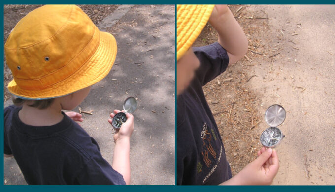 child using a compass