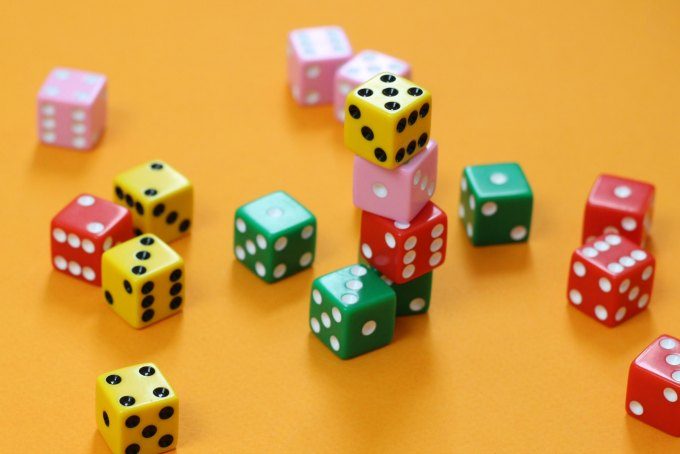Dice games and other games of chance will help sore losers learn how to play games with good sportsmanship