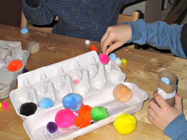 Kids love to play with pom poms