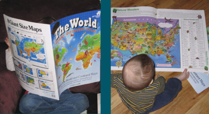 child reading an atlas