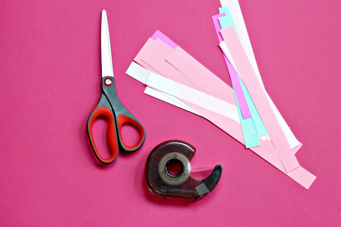 Supplies to cut Möbius strip hearts.