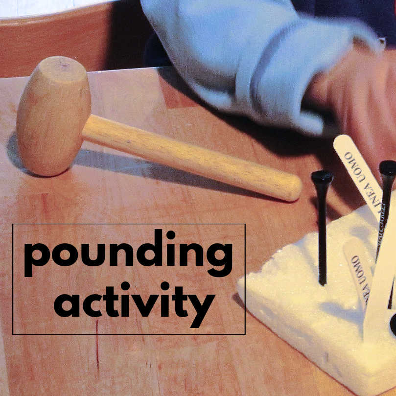 Toy wooden hammer and toddler pounding activity