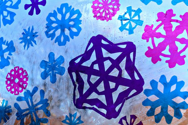 Snowflake faux stained glass window art project for kids