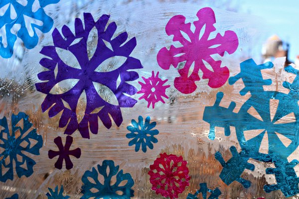 Snowflake stained glass window art with cellophane