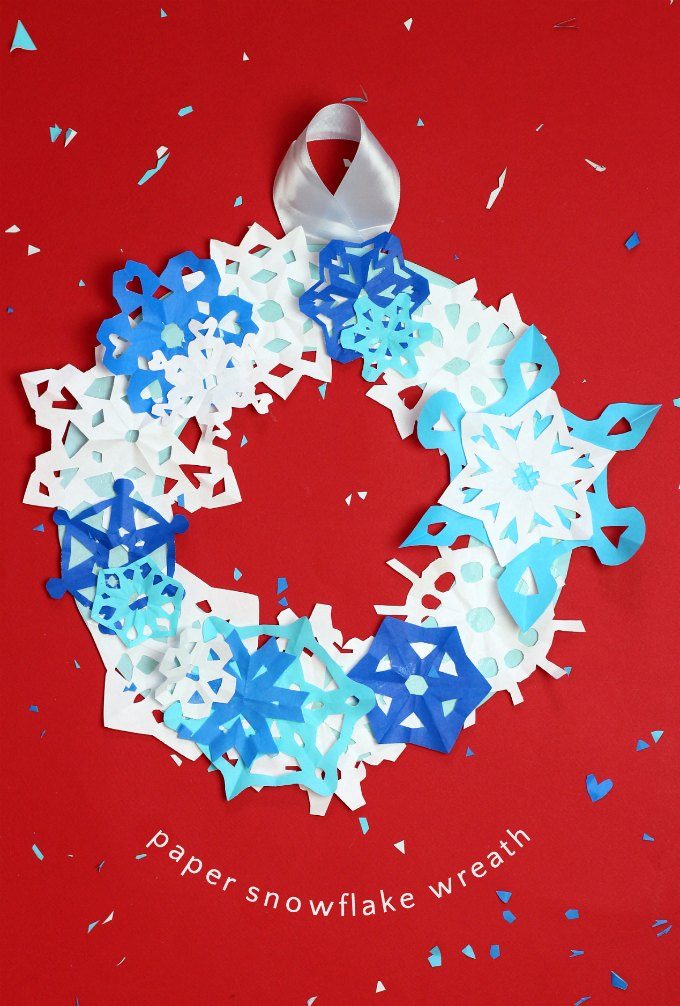 Paper snowflake winter wreath is an easy winter craft for children