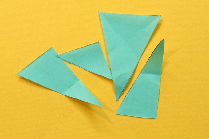 Mixed up pieces of paper triangle puzzle