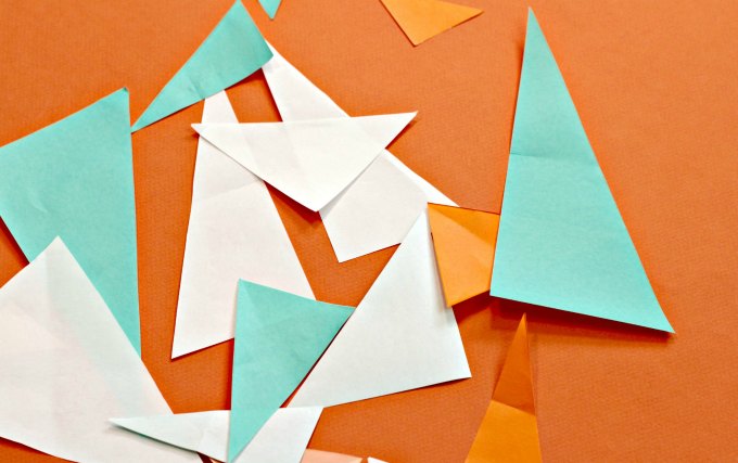 Mixed up triangle paper pieces