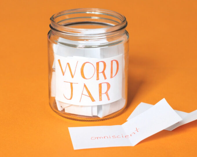 Glass jar filled with slips of paper